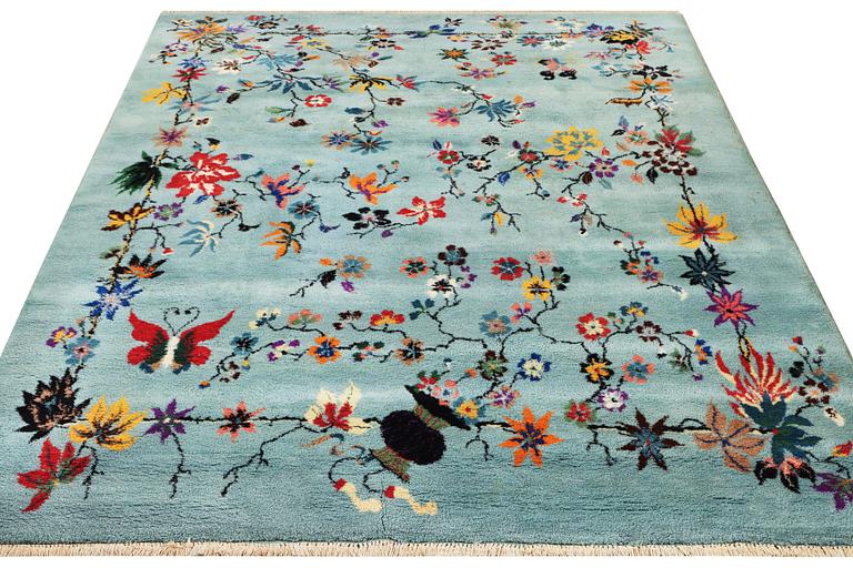 An oriental carpet, a. 370 x 261 cm.