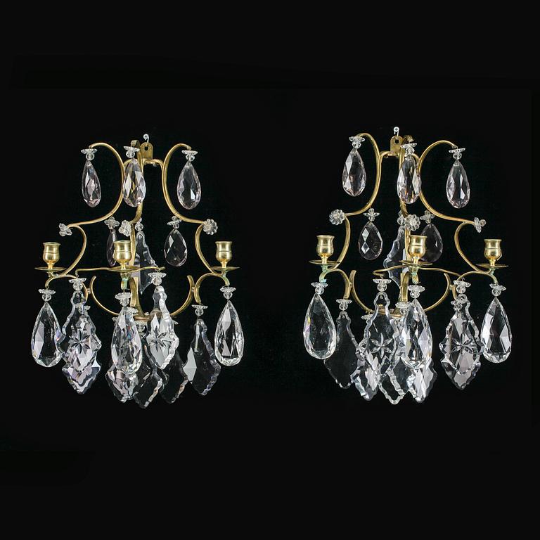 VÄGGLAMPETTER, ett par, rokokostil, omkr år 1900.