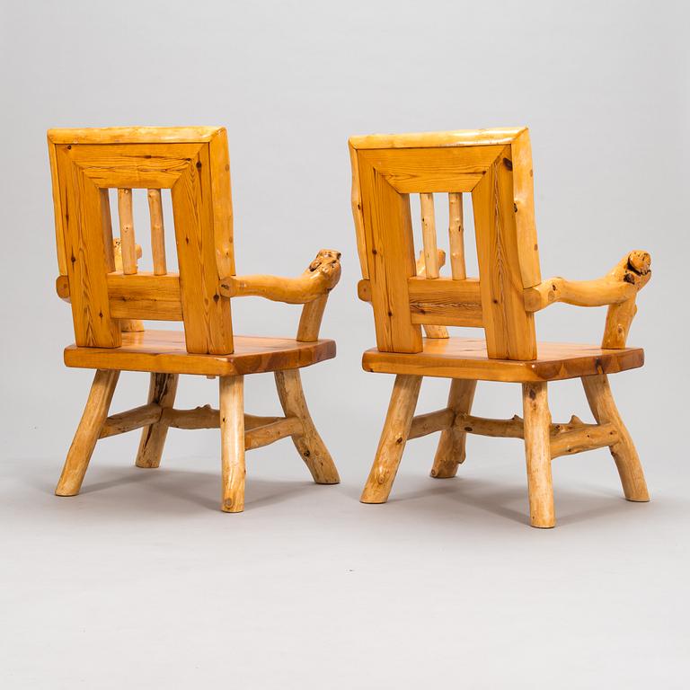 A pair of mid-20th-century armchairs made by Tauno Saarela Kuusamo Finland.