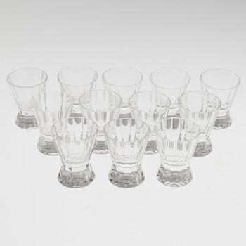 A set of twelve glasses and a cocktailshaker by Elis Berg, Kosta.