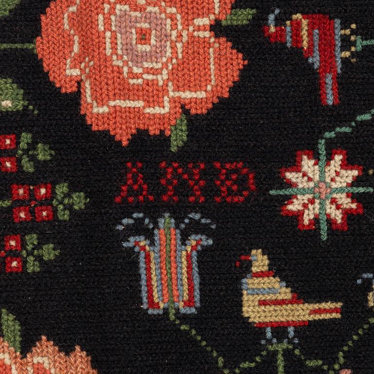 Åkdyna, korsstygnsbroderi, daterad 1817.