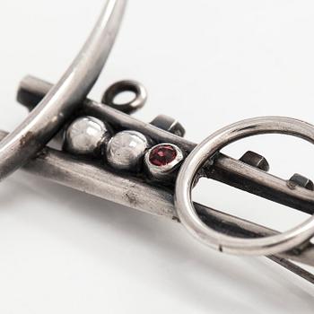 Heikki Kaksonen, brooch, faceted garnet, silver, Helsinki 1957.