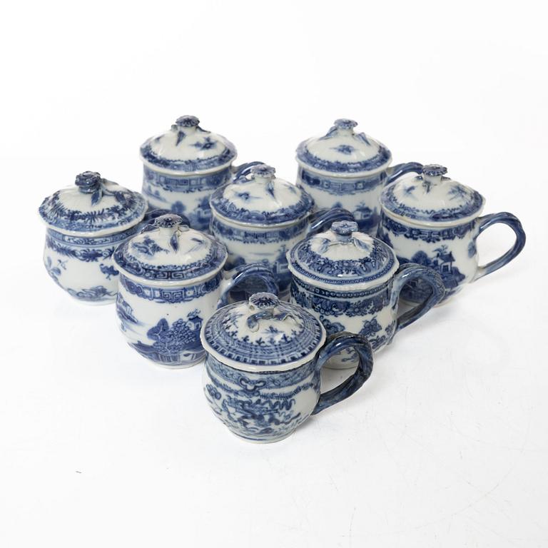 A group of eight Chinese blue and white porcelain custard cups with covers, Qing dynasty, Qianlong (1736-95).