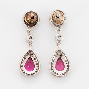 Brilliant-cut diamond and pink tourmaline earrings.