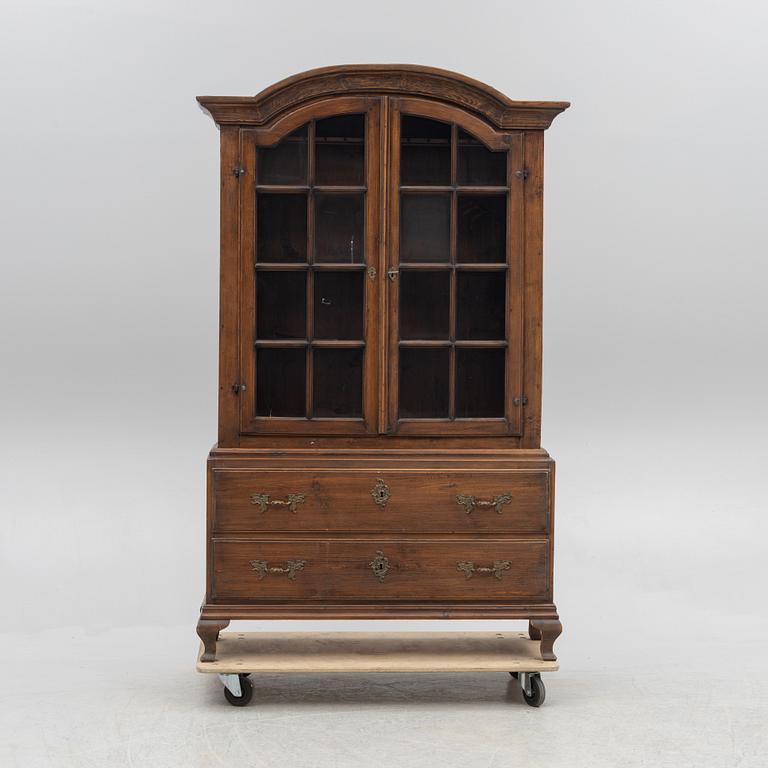A display cabinet, 18th Century.