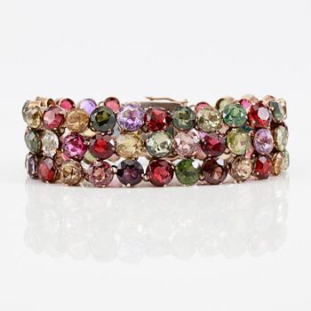 ARMBAND, förgyllt silver och olika stenar, bl a ametister, granater, citriner och syntetiska spineller.