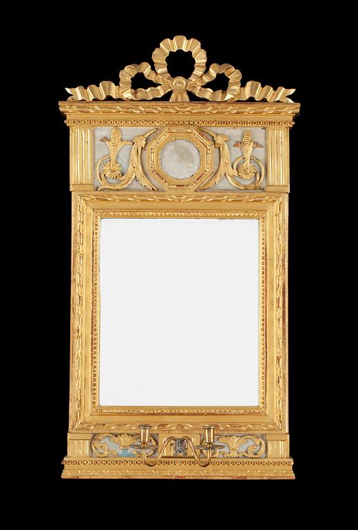 A pair of Gustavian late 18th century two-light girandole mirrors.