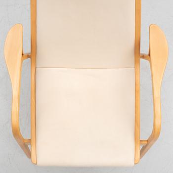 Yngve Ekström, fåtölj med fotpall, "Lamino", Swedese, tidigt 2000-tal.