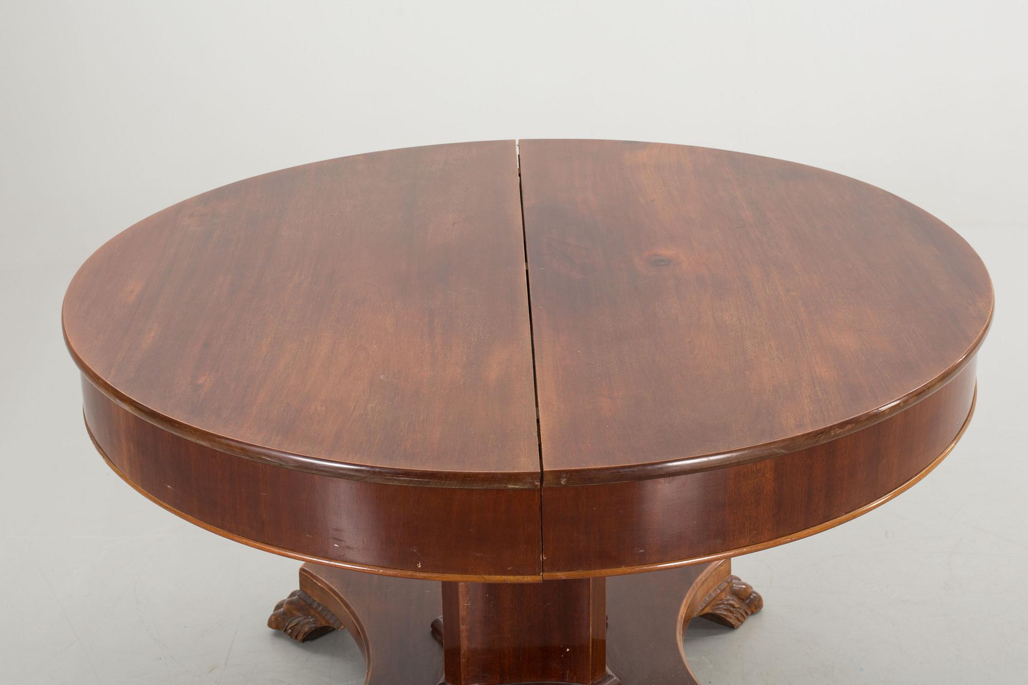 AN EMPIRE STYLE TABLE FROM AROUND 1900.