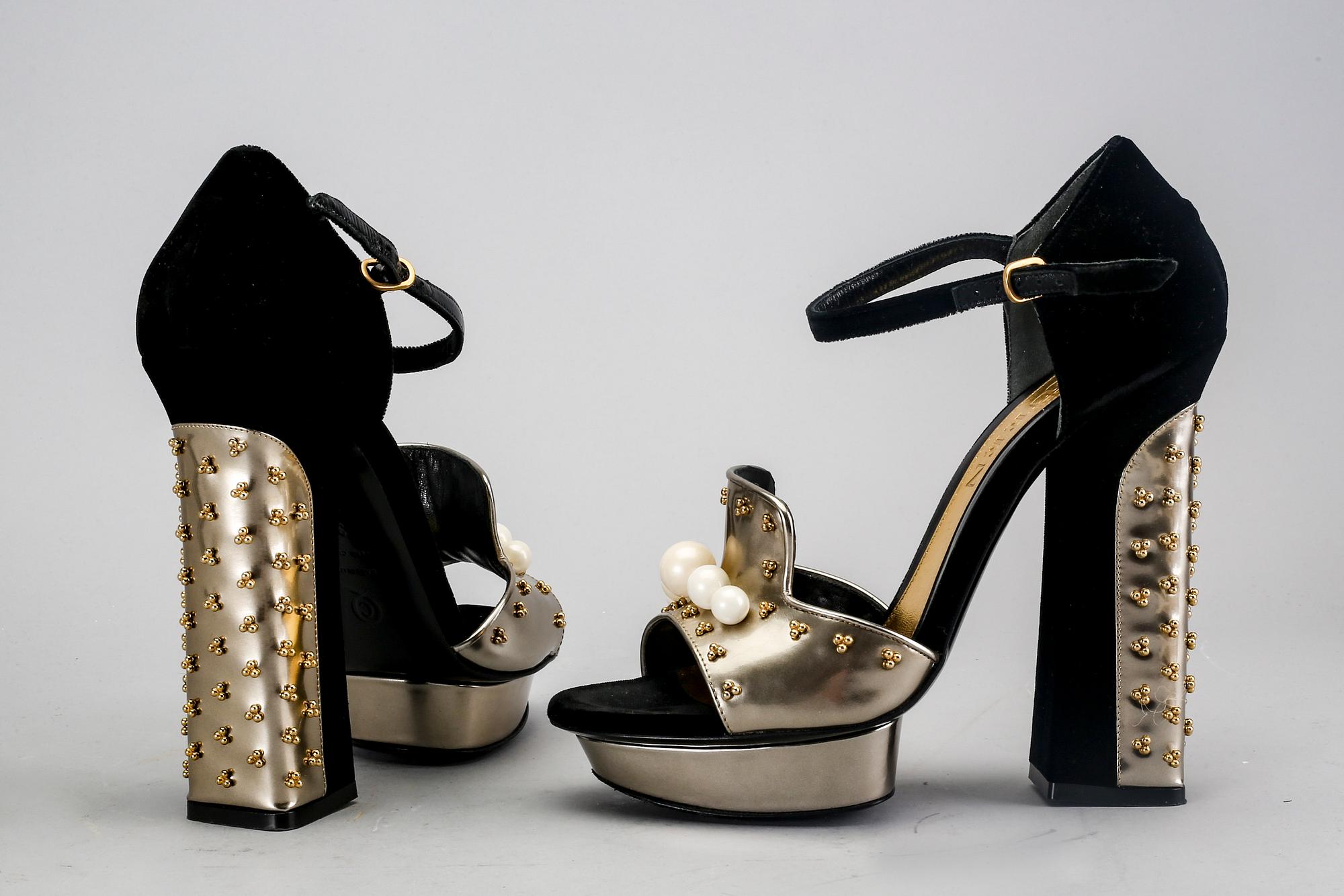 Alexander McQueen, a pair of shoes.