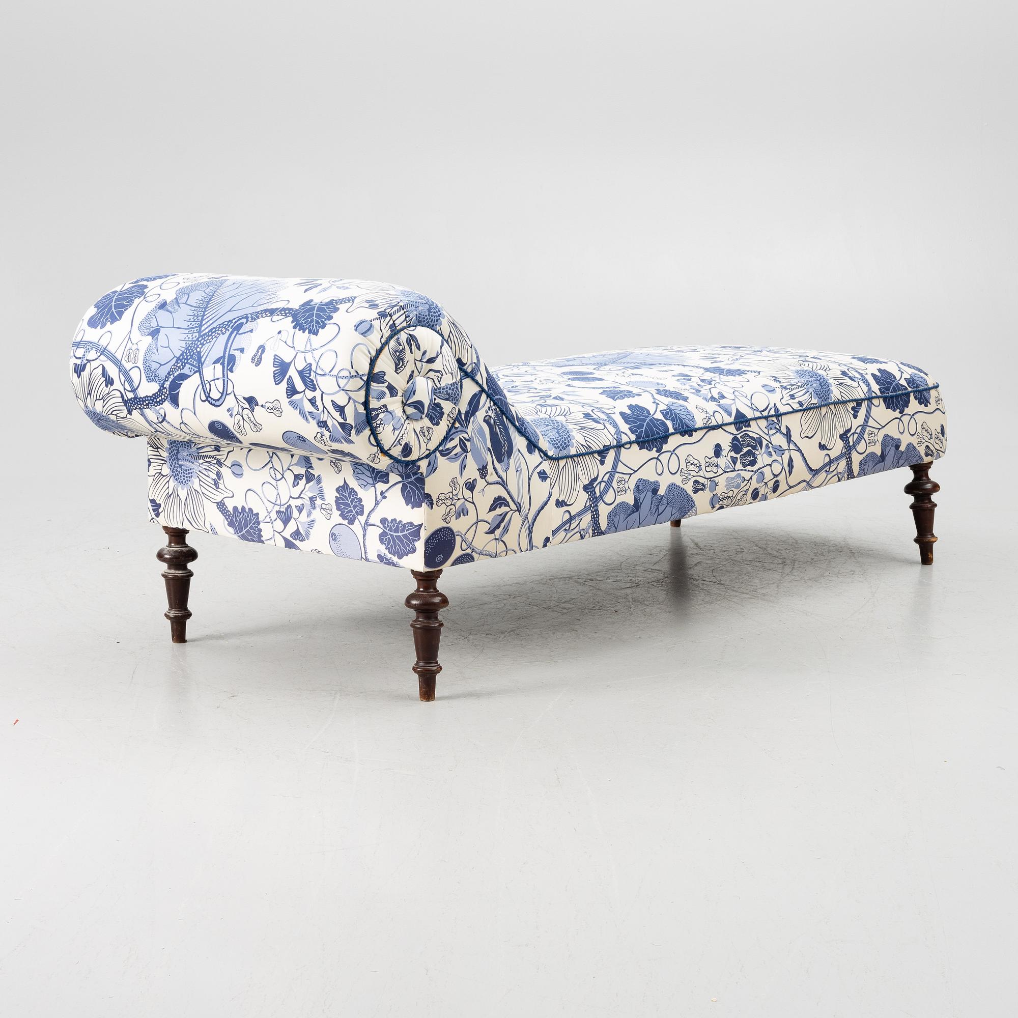 A chaise longue, circa 1900.