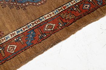 An antique Sarab rug, northwestern Iran, c. 213 x 107 cm.