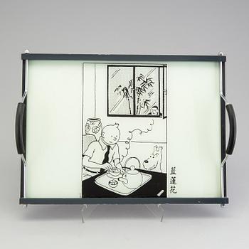 A set of 6 dinnerplates and two small plates and a serving tray depicting Tintin, Axis, France.