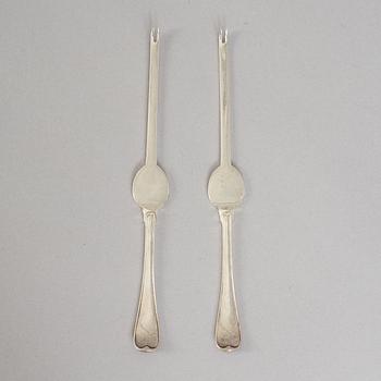 A set of ten French 19th century silver lobster-cutery.
