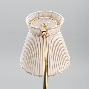 A 1950s model 2063 floor light manufactured by Orno.