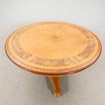 An Italian late 19th century walnut and birch table.