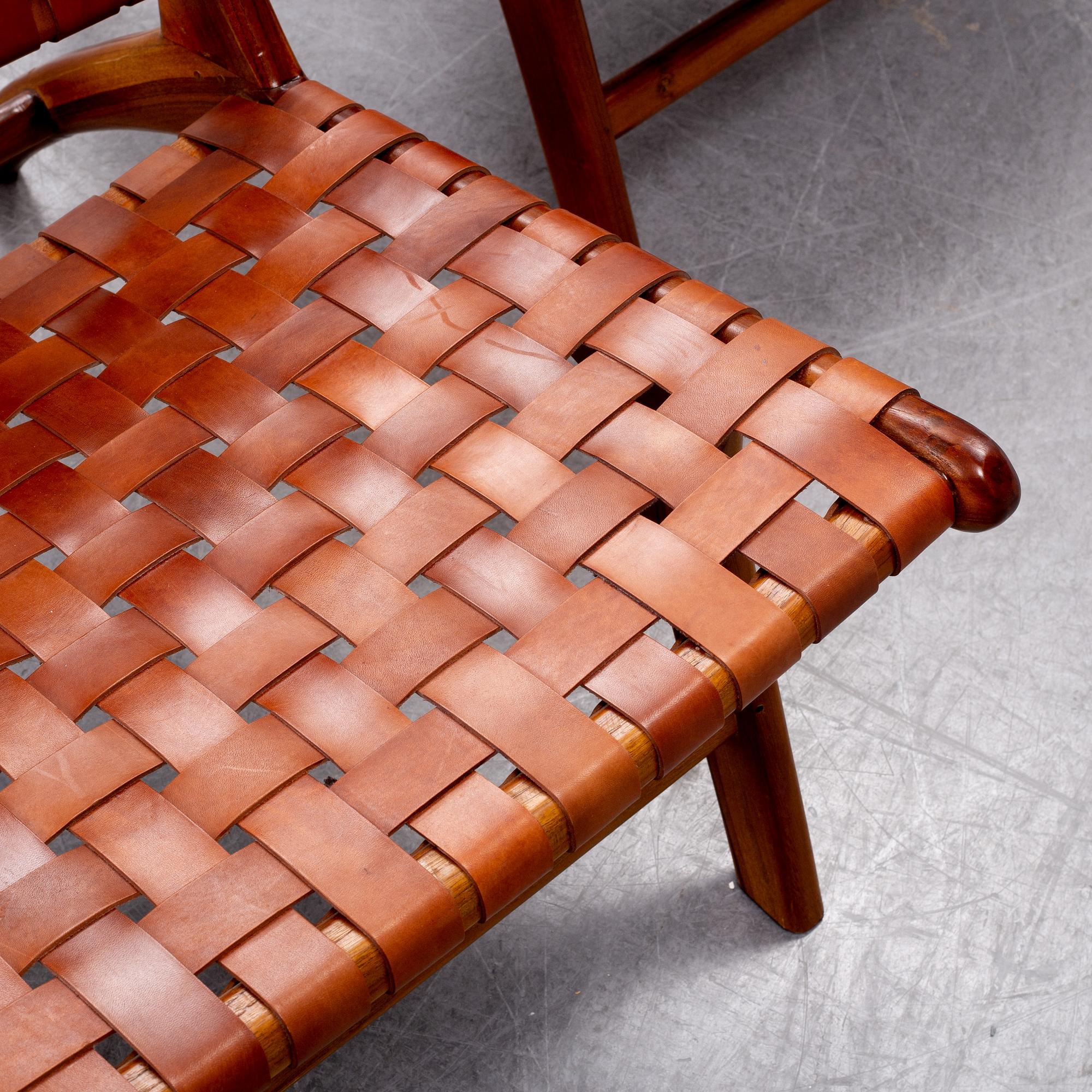 A pair of 'Porto' teak easychairs by Newport.