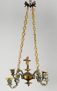 TAKAMPEL, patinerad metall och mässing, 1800-tal. Diam 40.