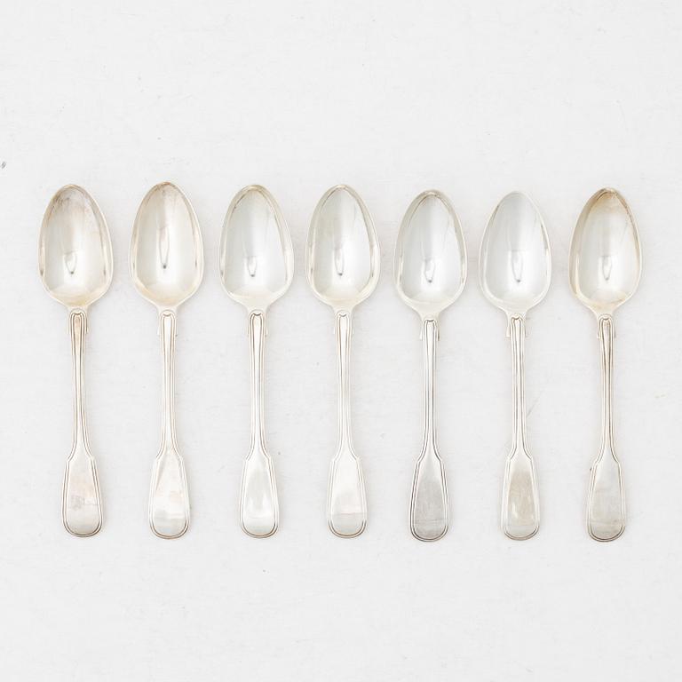 Seven silver spoons, French model, mostly William Comyns, London 1916.