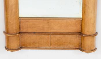 A Swedish Karl Johan mirror veneered with birch.