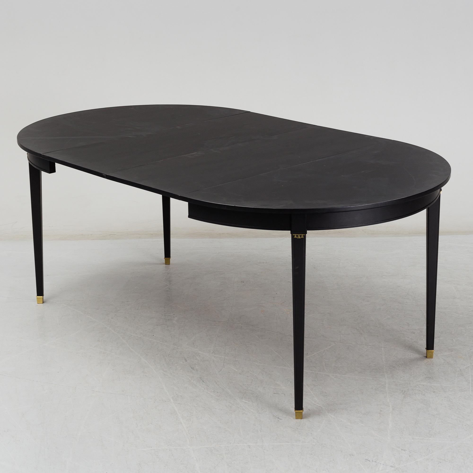 A Gustavian style painted dining table, second half of the 20th century.