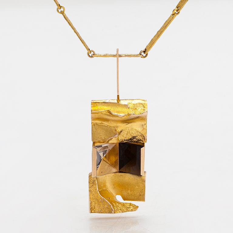 Björn Weckström, Halsband "Janus", 14K guld, rökkvarts och bergskristall. Lapponia 1969.