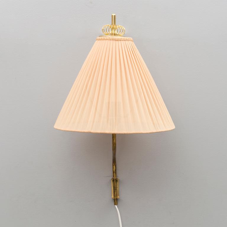 A mid 20th century wall light marked Idman, Finland.