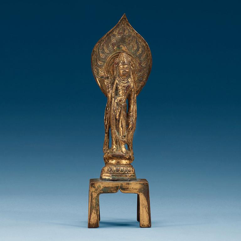A gilt bronze figure of Guanyin, presumably Sui/Tang dynasty.