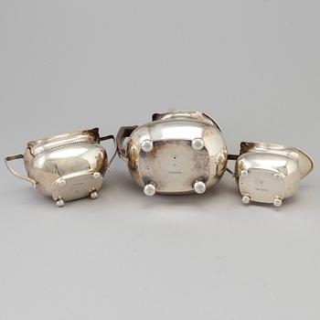 A three piece silver coffee set by The Alex Clark Company, London, first half of the 20th century.