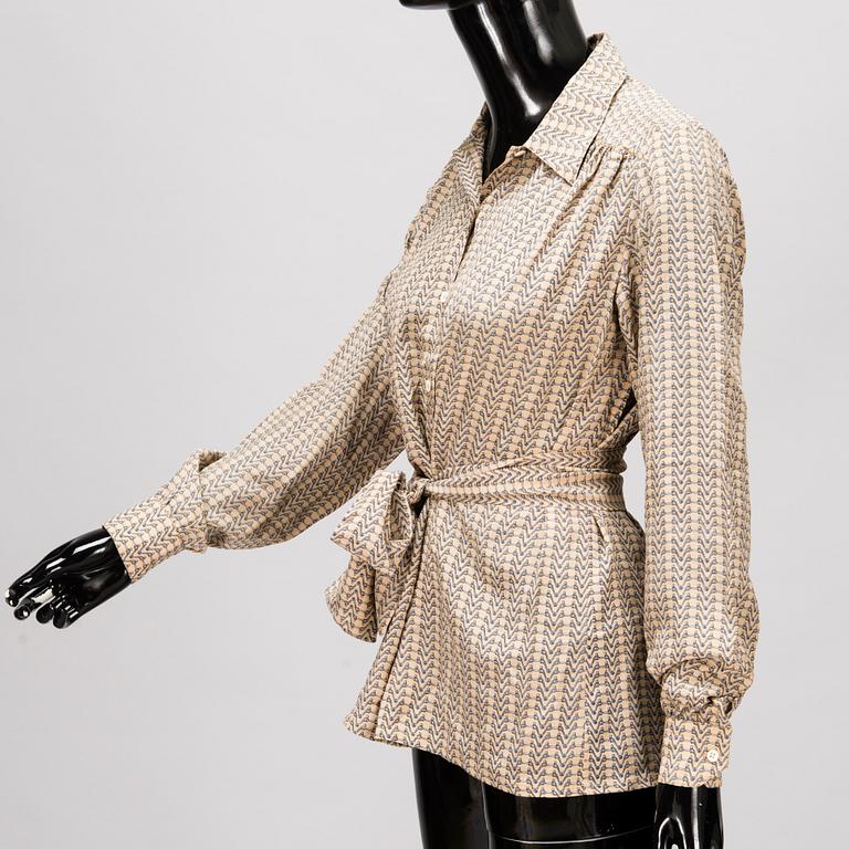 GUCCI Silk Blouse and a Leather Belt.