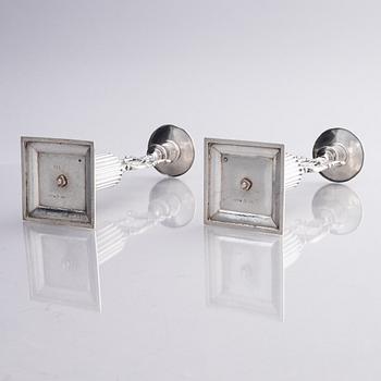 A pair of Swedish silver candlesticks, marks of Gustaf Folcker, Stockholm 1825.