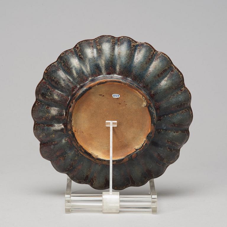 A brown and blue glazed dish, South East Asia, 19th Century or older.