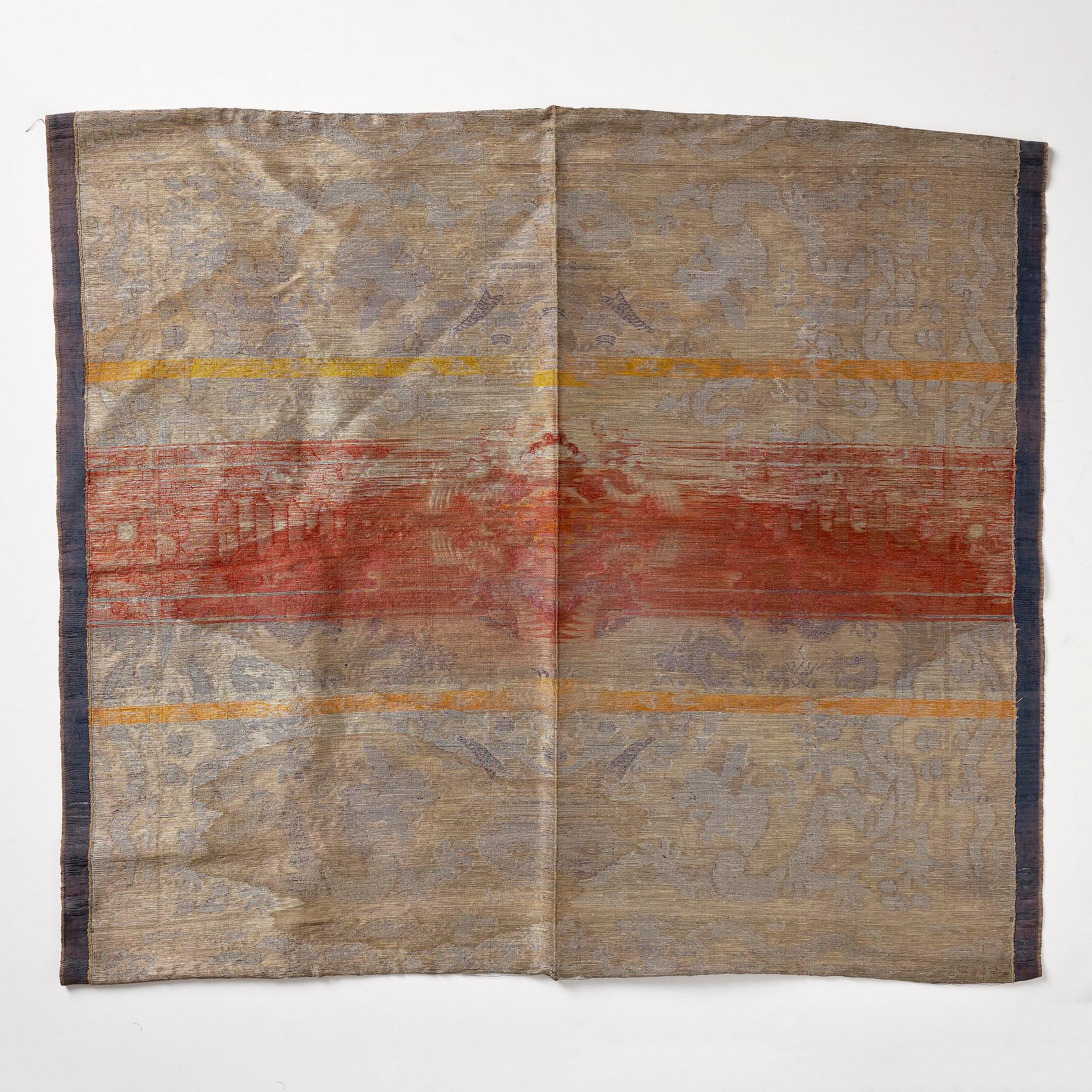 A silk blue-ground brocade panel, late Qing dynasty/early 20th century.