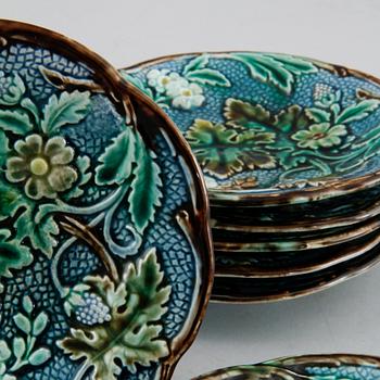 Eighteen majolica small plates and a serving dish from Rörstrand, second half of the 19th century.