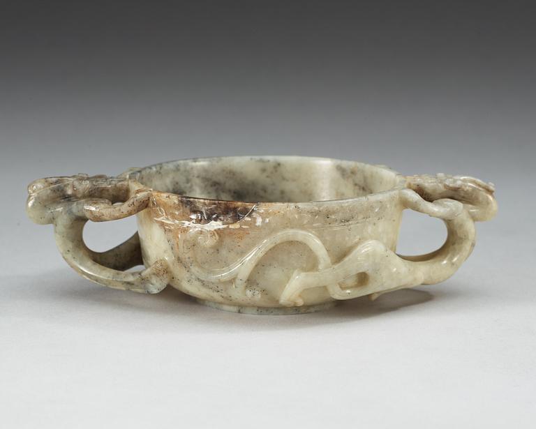 A carved nephrite ceremonial wine cup, late Qing dynasty.