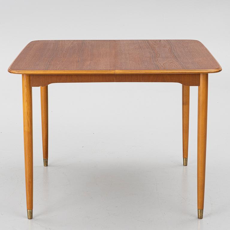 A dining table, teak, 1960s.