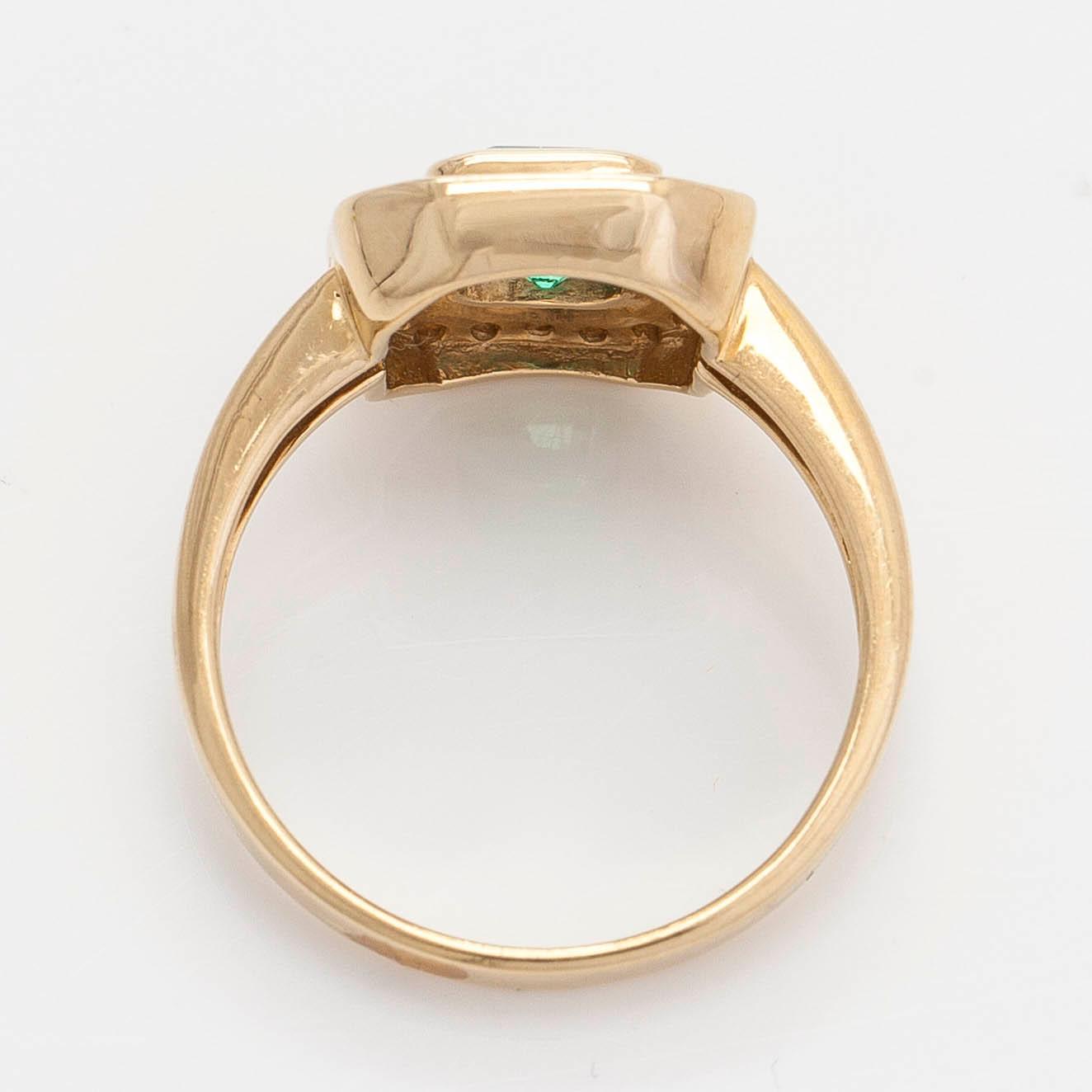 Ring, 14K gold, with an emerald and diamonds. Finnish import marks 1997.