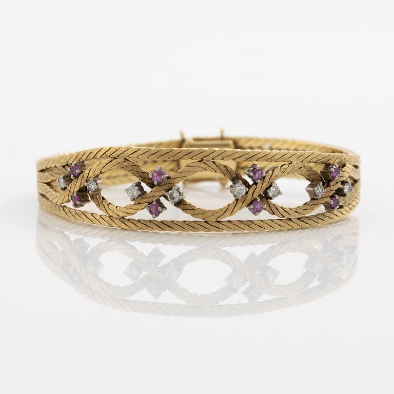 Bracelet 18K gold with diamonds and rubies.