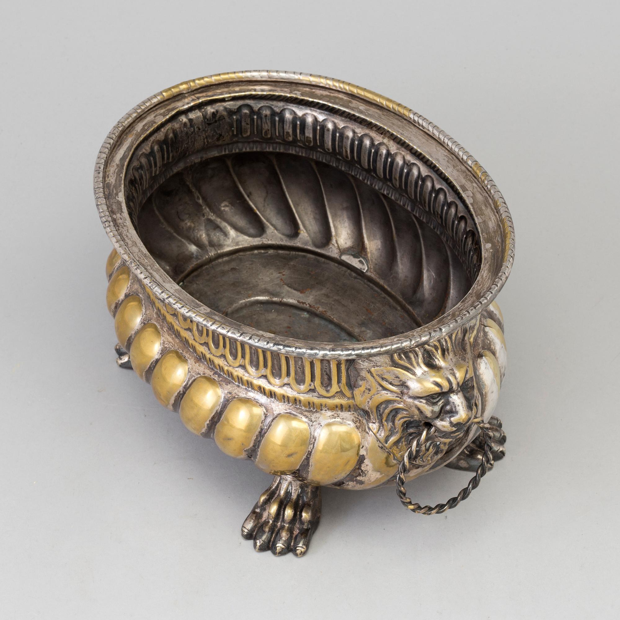 A 19th century brass flower pot.