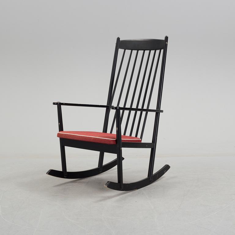 A mid 20th century rocking chair.