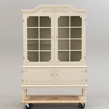 A gustavian style cabinet, last quarter of the 20th century.
