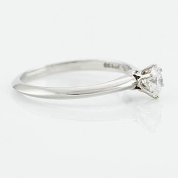 Tiffany & Co, platinum ring with a brilliant-cut diamond.