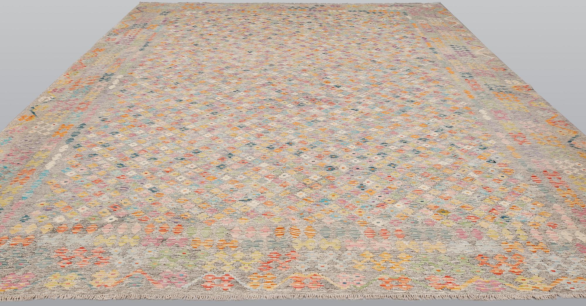 A Kilim carpet, approx. 432 x 368 cm.