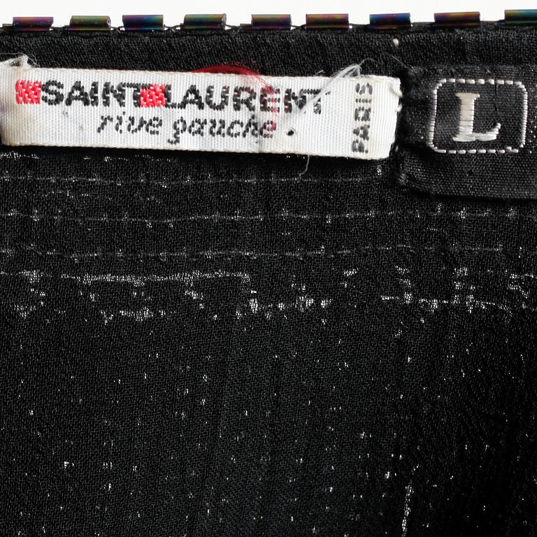 YVES SAINT LAURENT, top, 1985-86.