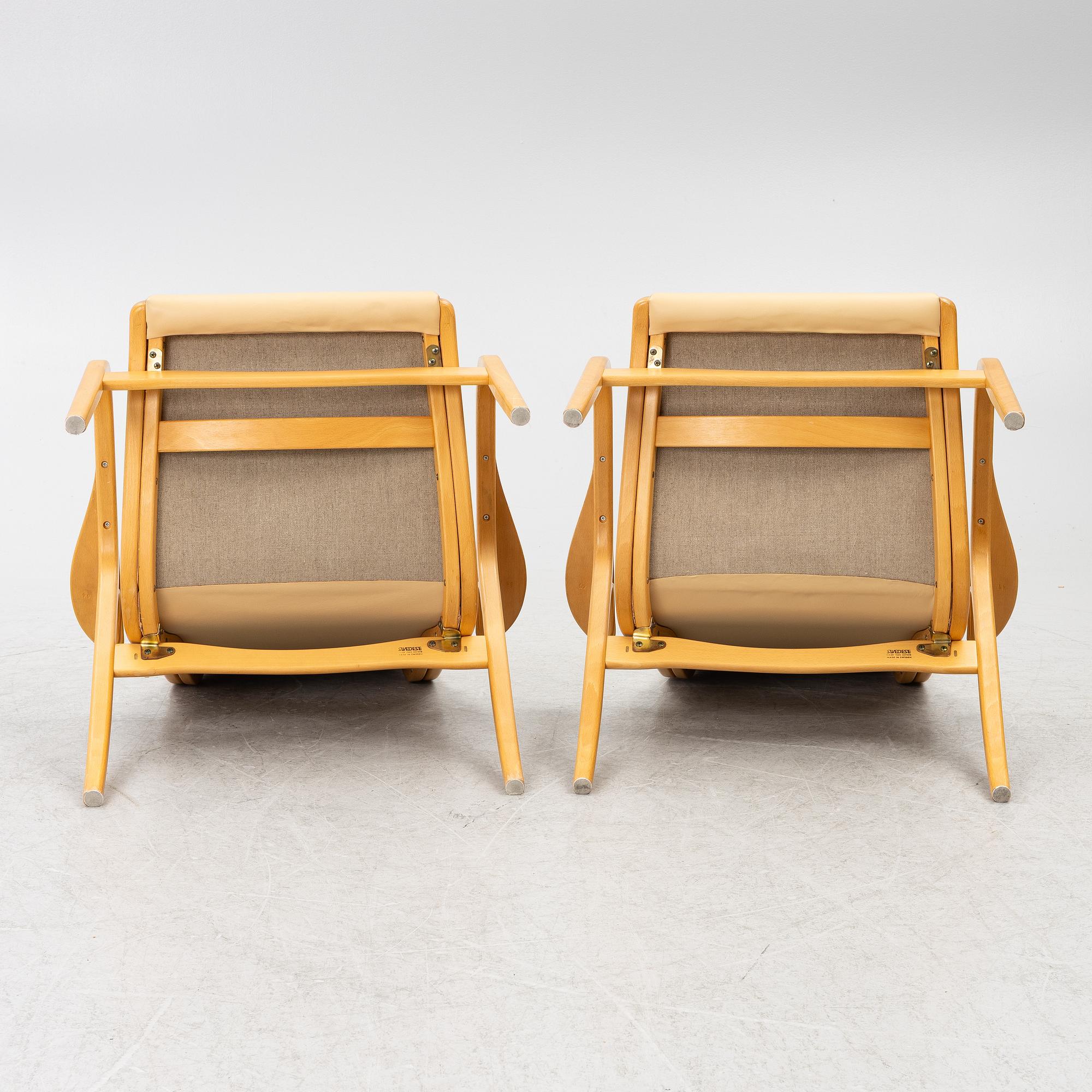 Yngve Ekström, Armchairs, a pair, "Lamino", Swedese, late 20th century.