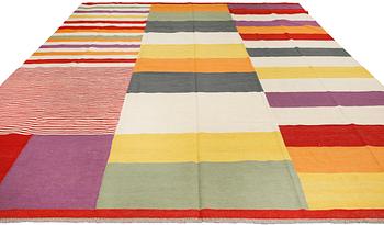 A flat weave carpet, c 395 x 297 cm.