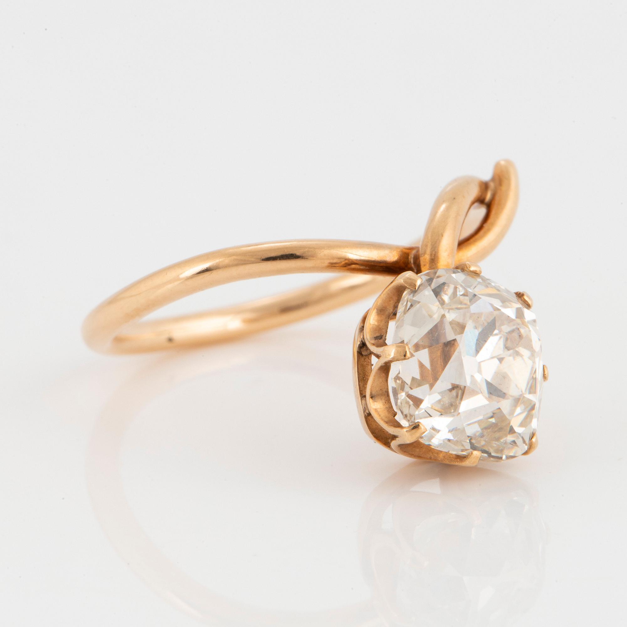 A 14K gold ring set with an old-cut diamond ca 3.50 cts quality ca J/K vs.