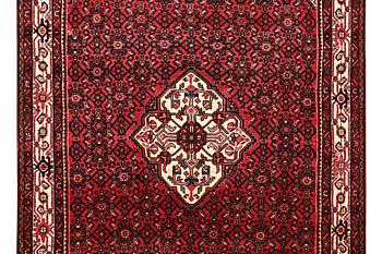 A Hosseinabad carpet, c. 310 x 210 cm.