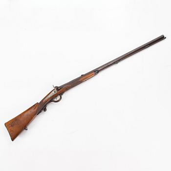 A mid 19th Century percussion rifle.