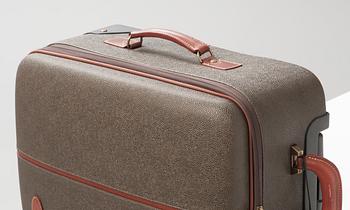 A hardsided trolley by Mulberry.